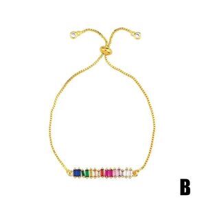 GOLD DIPPED MULTICOLOR CZ.S ON A PULL TIE GOLD DIPPED BRACELET